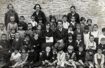 Leon Beraha with students of the Jewish school