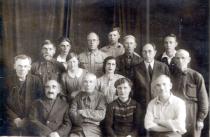 Itzhak Zakh, his wife Ida Zakh and their employees