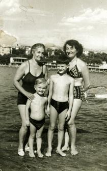 Vera Erak, her children Branislav and Vesna, and her mother Edith Erak (nee Bondy) at the beach in Croatia